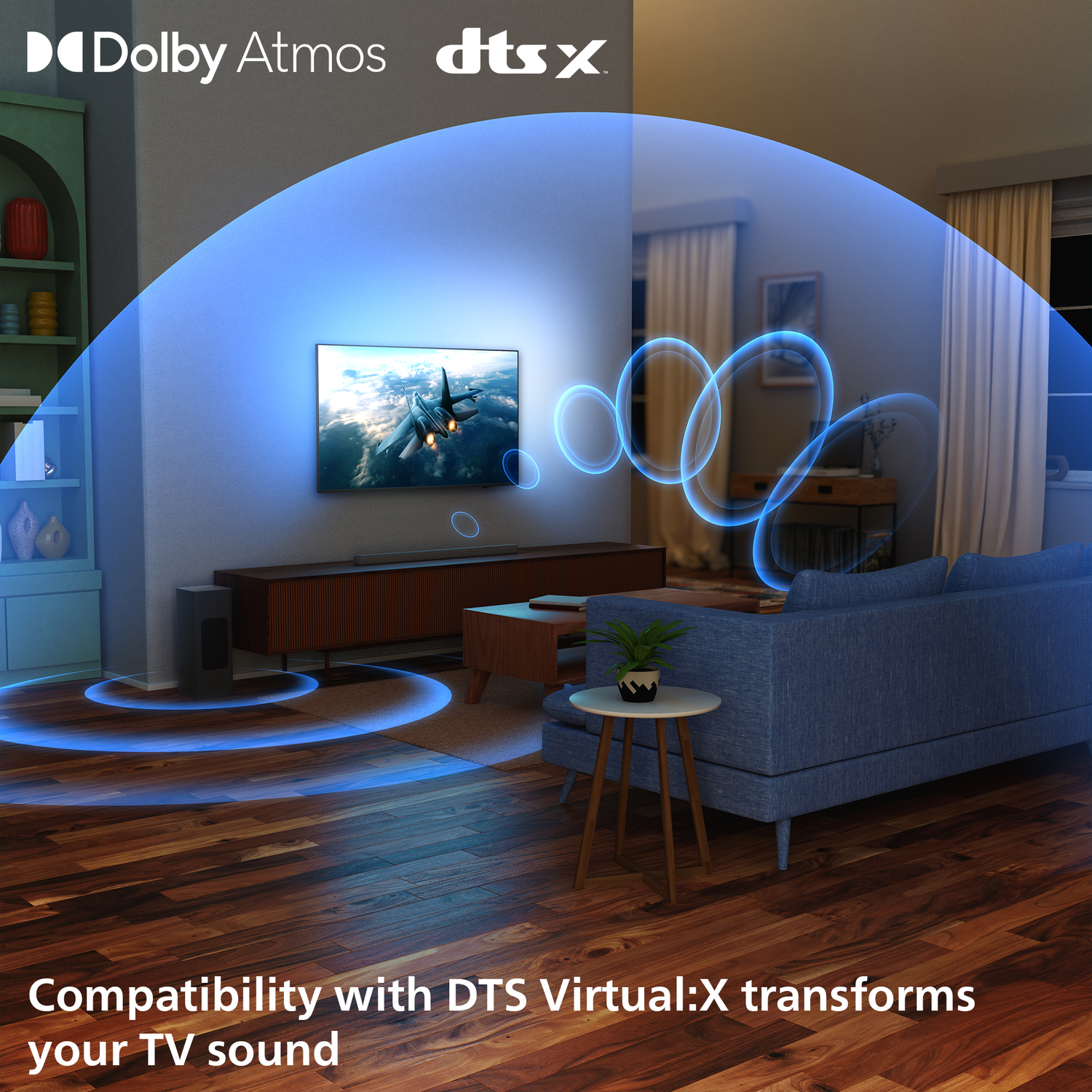 Living room with a TV showing a jet, blue sofa, wooden floor. Sound waves emanate from the TV. Dolby Atmos and DTS:X logos are visible.