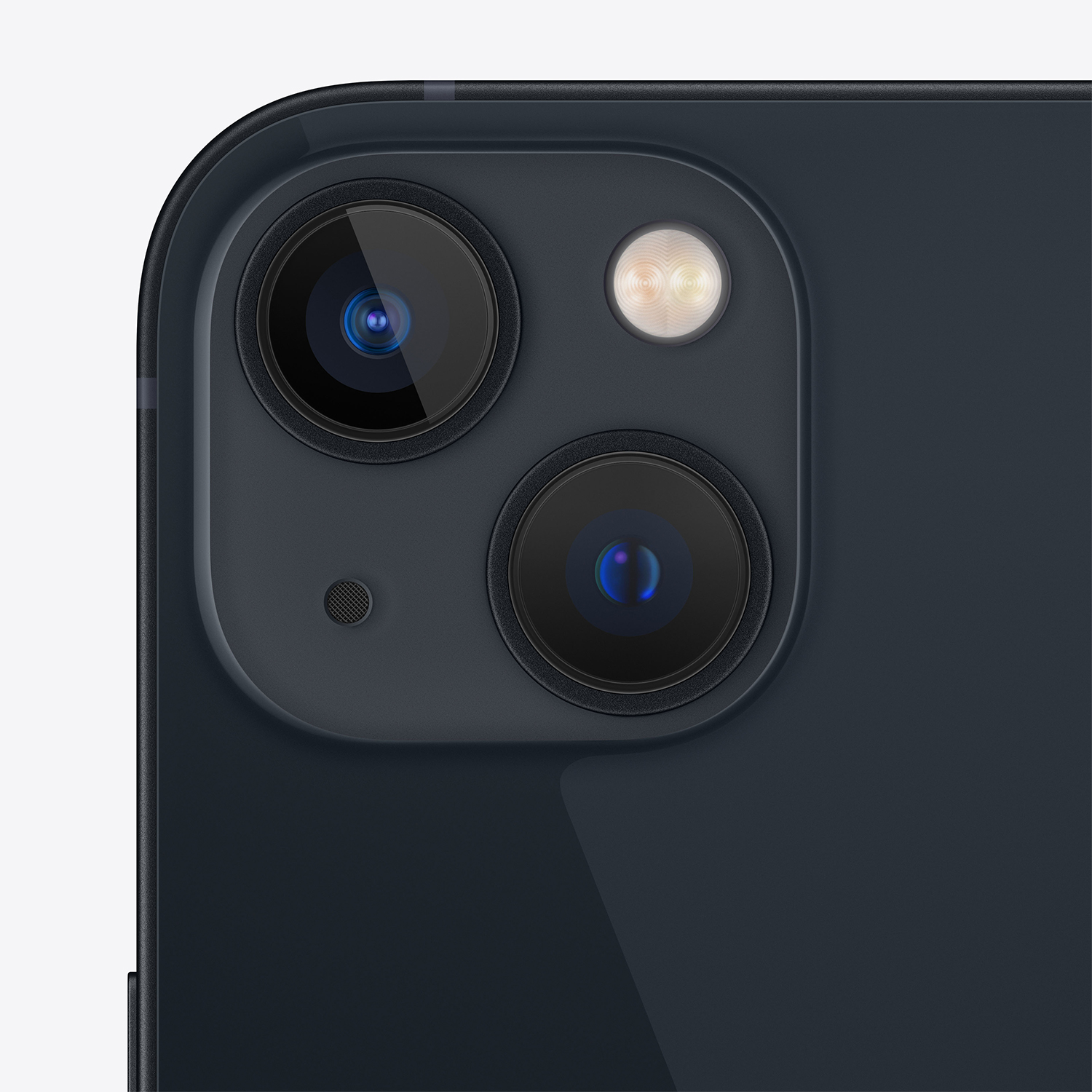Primo piano del modulo fotocamera di uno smartphone. Presenta due obiettivi, un flash e un microfono. La parte posteriore del telefono è blu scuro.