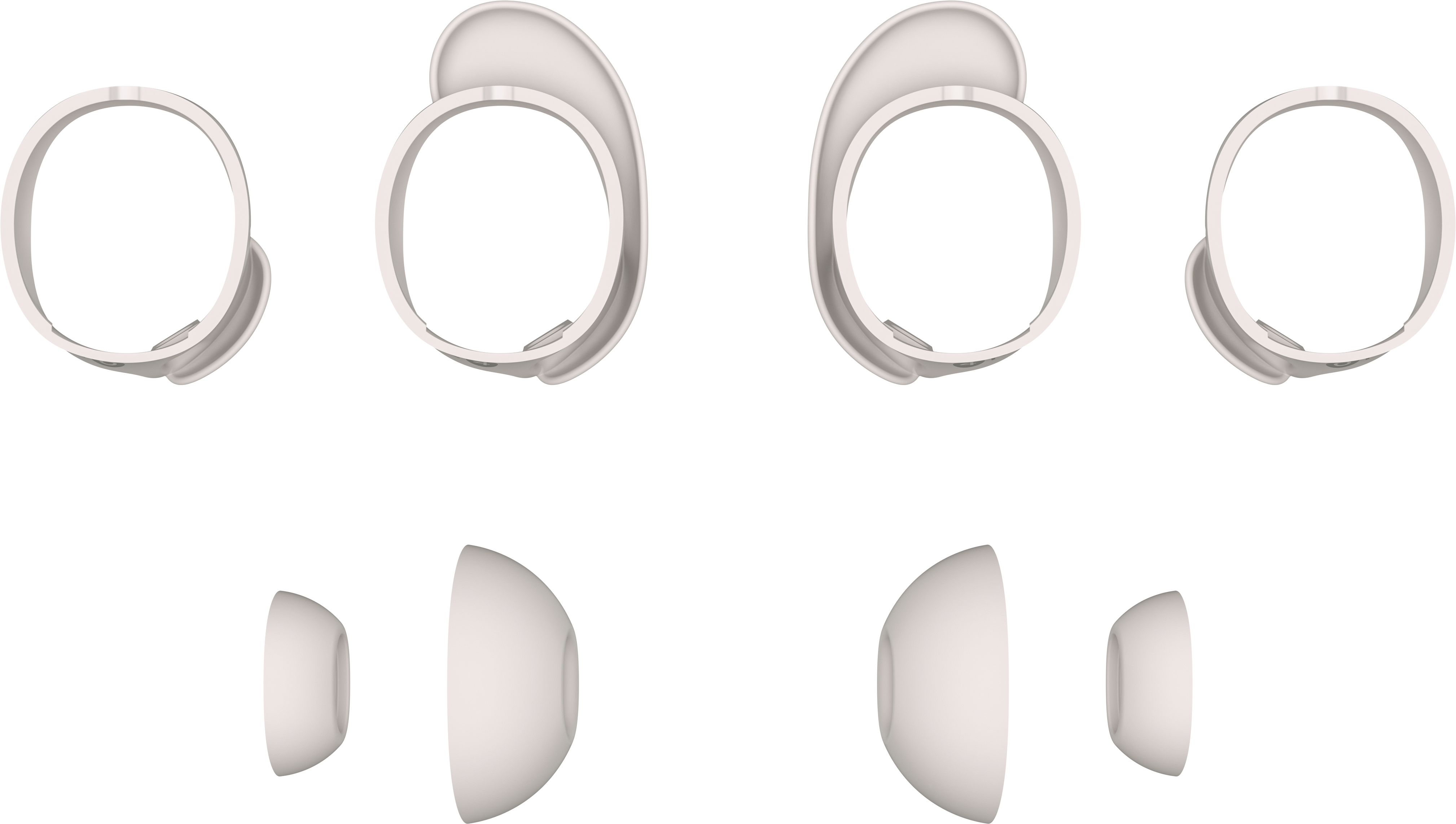 Composants d'écouteurs blancs disposés sur fond noir. Inclut quatre montures et deux paires d'embouts.