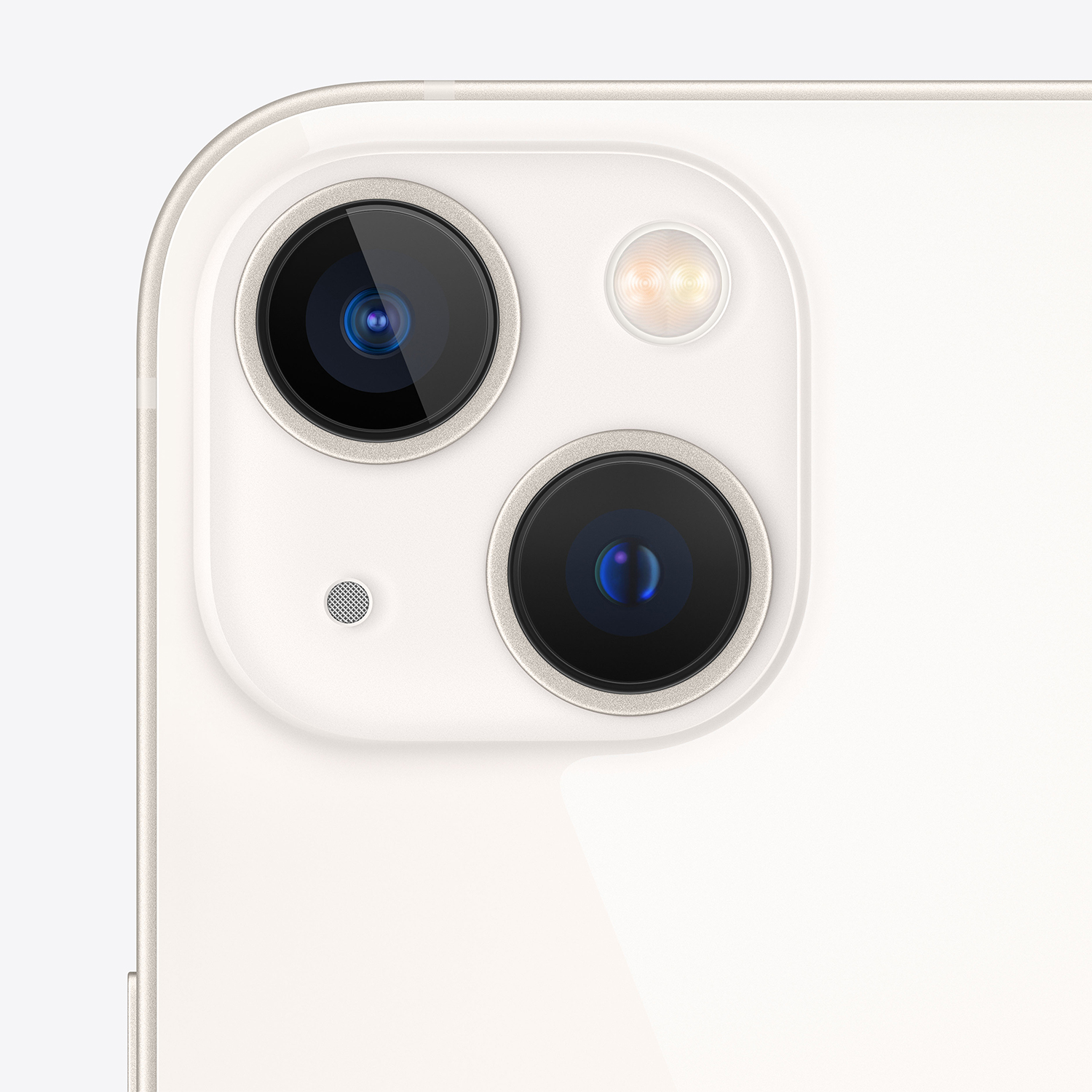 Primo piano del modulo fotocamera di uno smartphone con due obiettivi, un flash e un microfono. Il telefono è bianco.