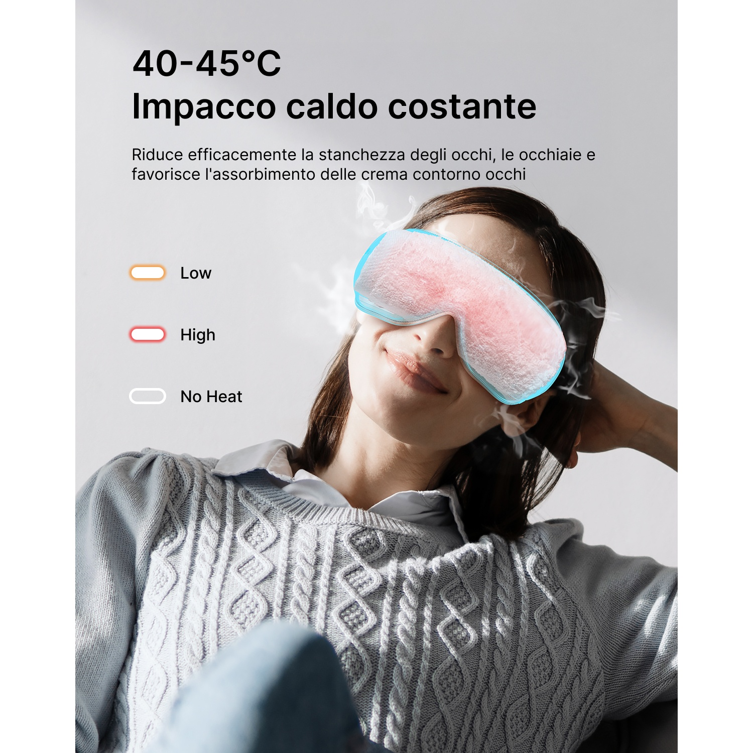 Una donna indossa una maschera per gli occhi con vapore. Testo: '40-45°C Impacco caldo costante'. Opzioni: Low, High, No Heat.