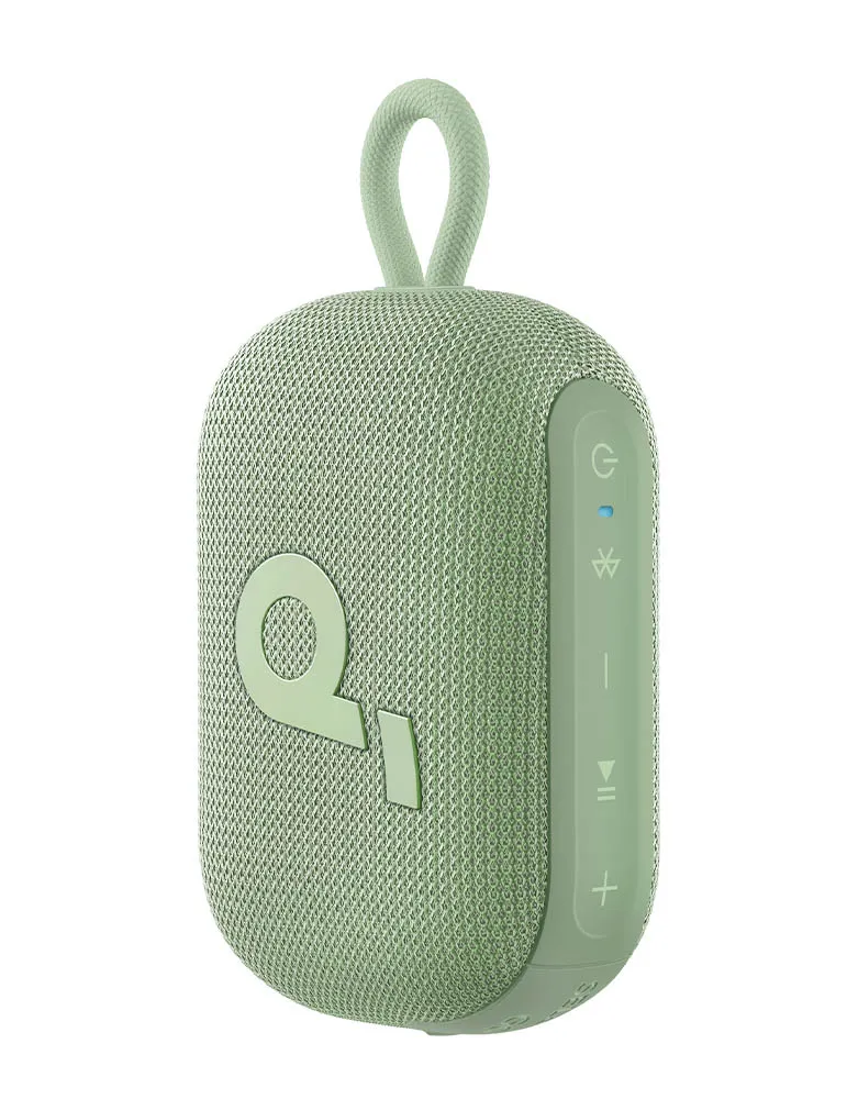 Jasnozielony głośnik przenośny z pętlą. Z przodu logo, a z boku przyciski sterowania.