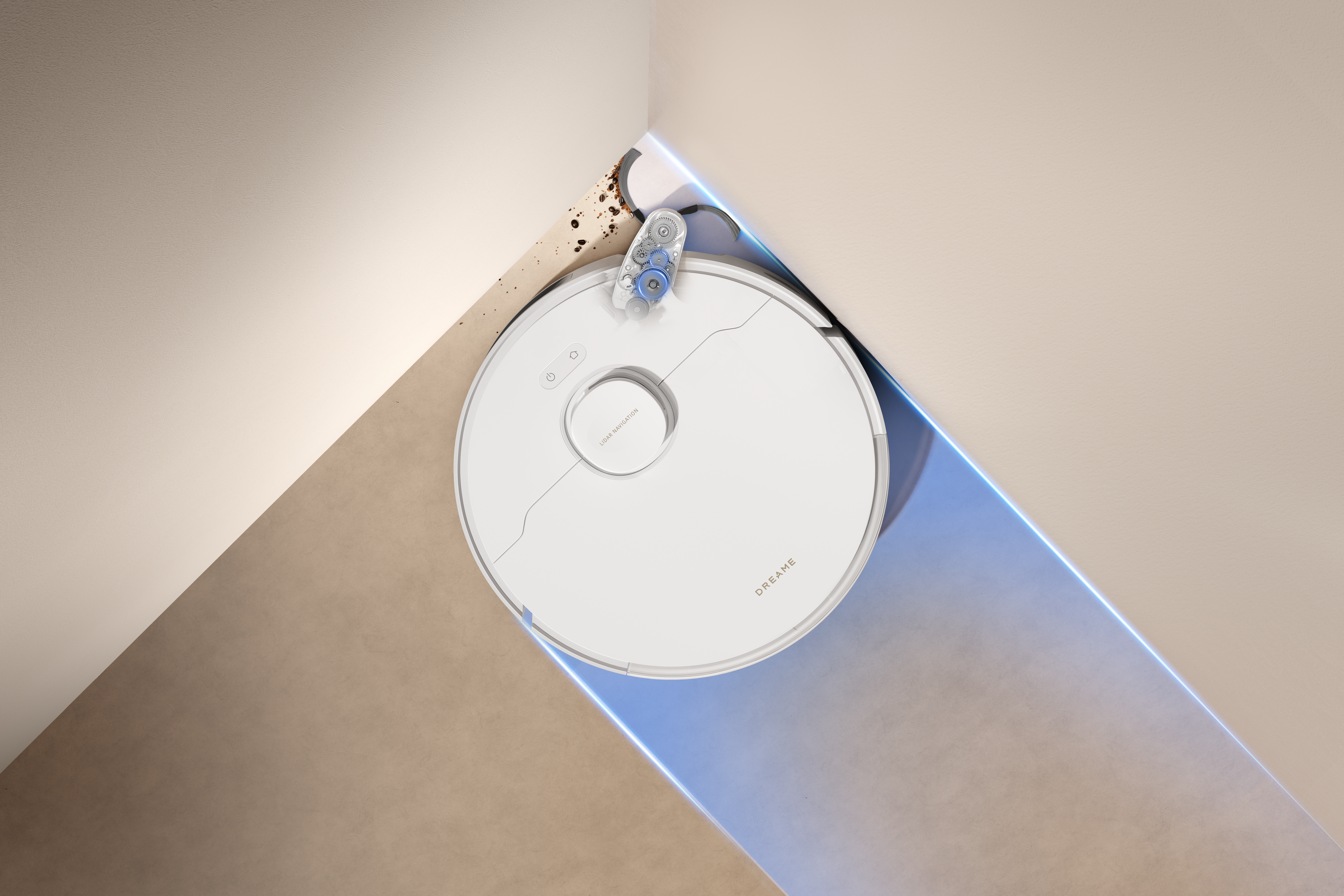 Biały robot odkurzający w rogu. Odkurzacz ma okrągły kształt z przyciskami i obrotową szczotką. Widoczne są resztki.