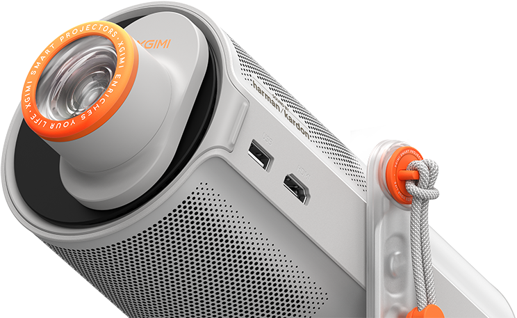 Egy fehér és narancssárga XGIMI okosprojektor. Van rajta lencse, portok és egy hordszíj. A lencsén a felirat: XGIMI Smart Projectors.