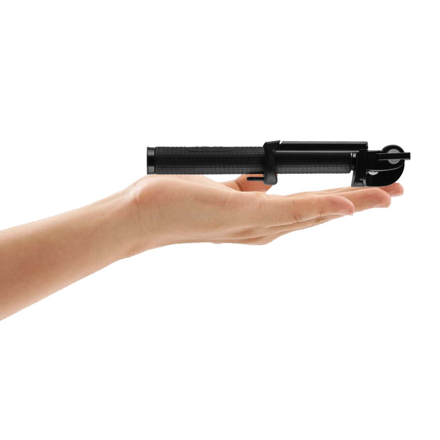 A hand holds a black selfie stick against a black background. The stick is extended and ready for use. The hand is in focus.