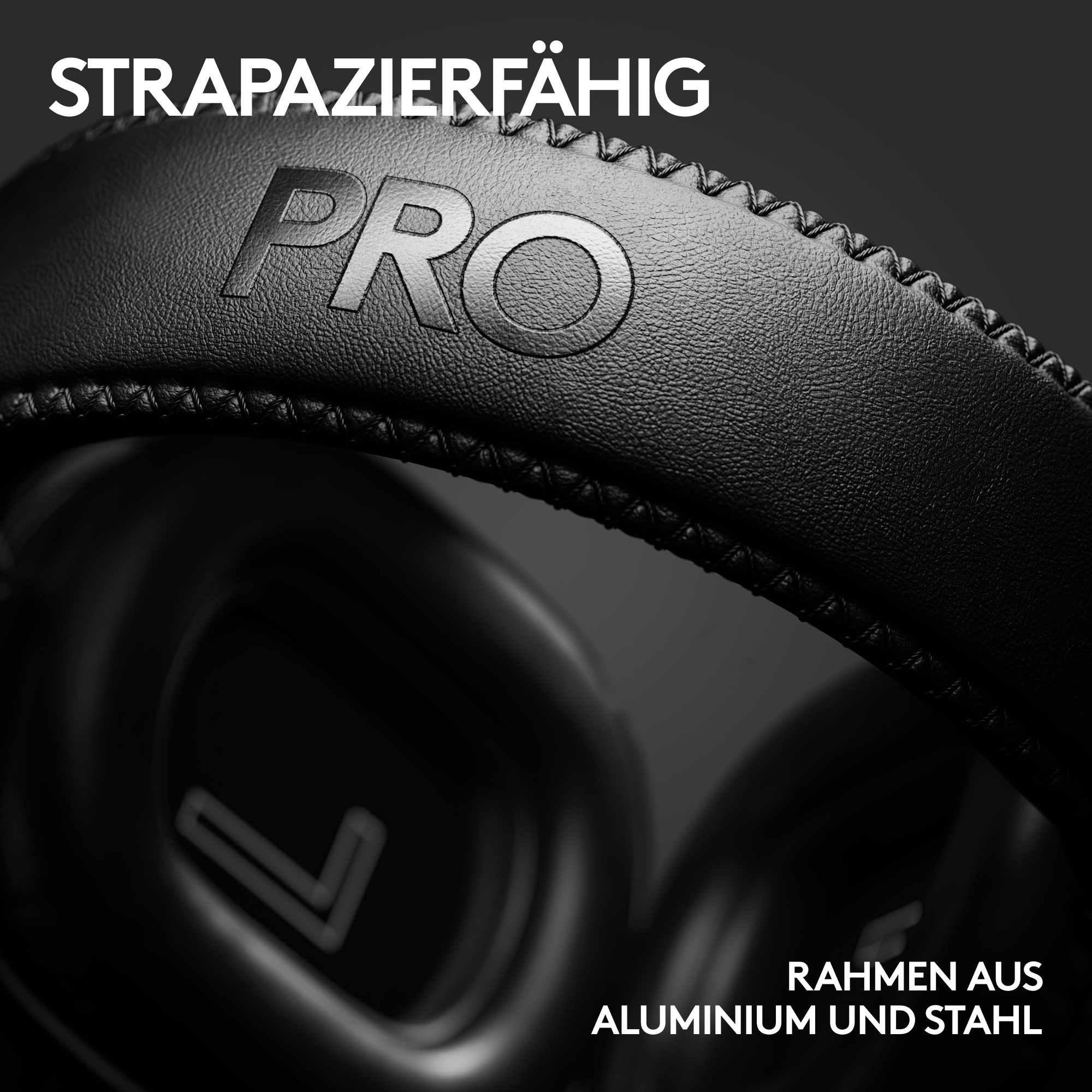 Nahaufnahme von schwarzen Kopfhörern. Das Wort PRO ist geprägt. Der Rahmen besteht aus Aluminium und Stahl. Deutscher Text STRAZIERFÄHIG.