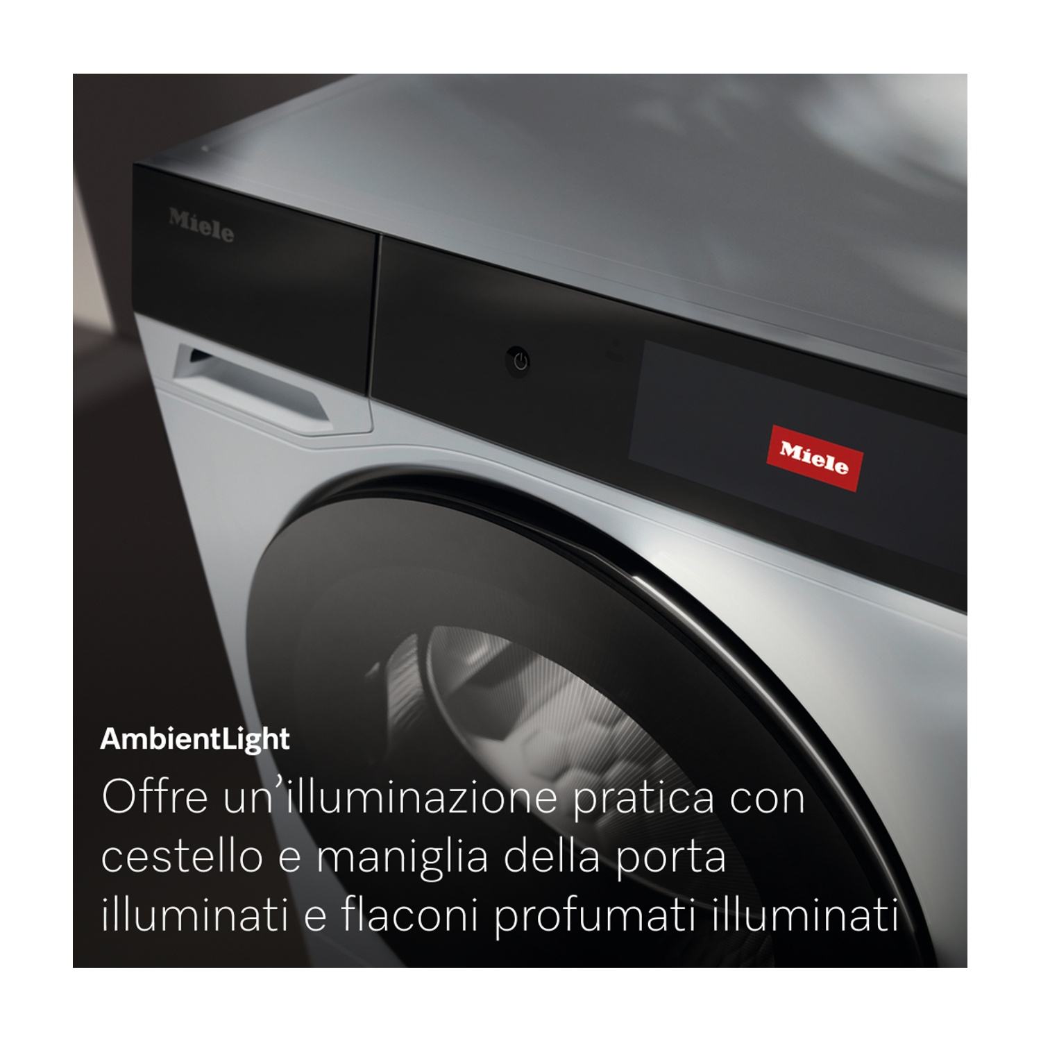 Primo piano di una lavatrice Miele. È bianca e nera, con il marchio e uno schermo. Il testo recita 'AmbientLight'.