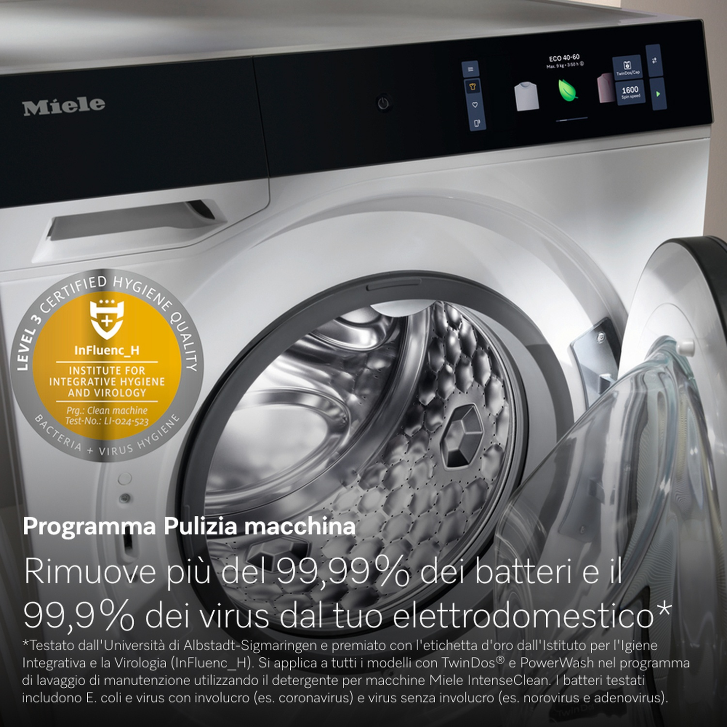 Una lavatrice Miele con la porta aperta. Il testo dice che rimuove il 99,99% dei batteri e il 99,9% dei virus.