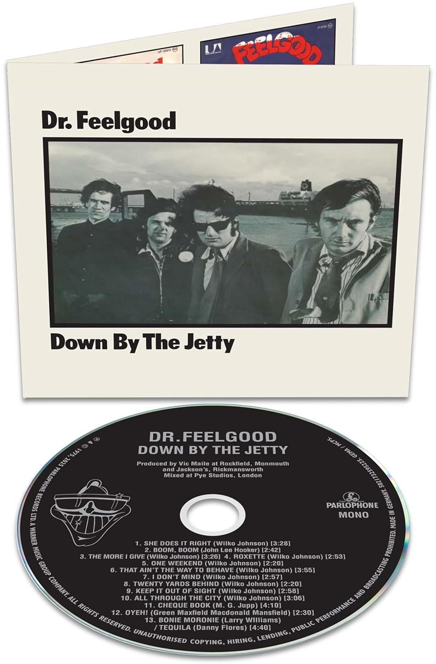 Album borító. Négy öltönyös férfi egy kikötői jelenet előtt áll. Alul egy CD található. Az album címe: Dr. Feelgood.