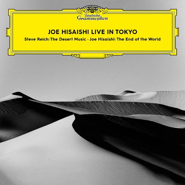 Albumcover: Dünen in Schwarzweiß. Text in gelber Box: Joe Hisaishi Live in Tokyo. Deutsche Grammophon Logo.