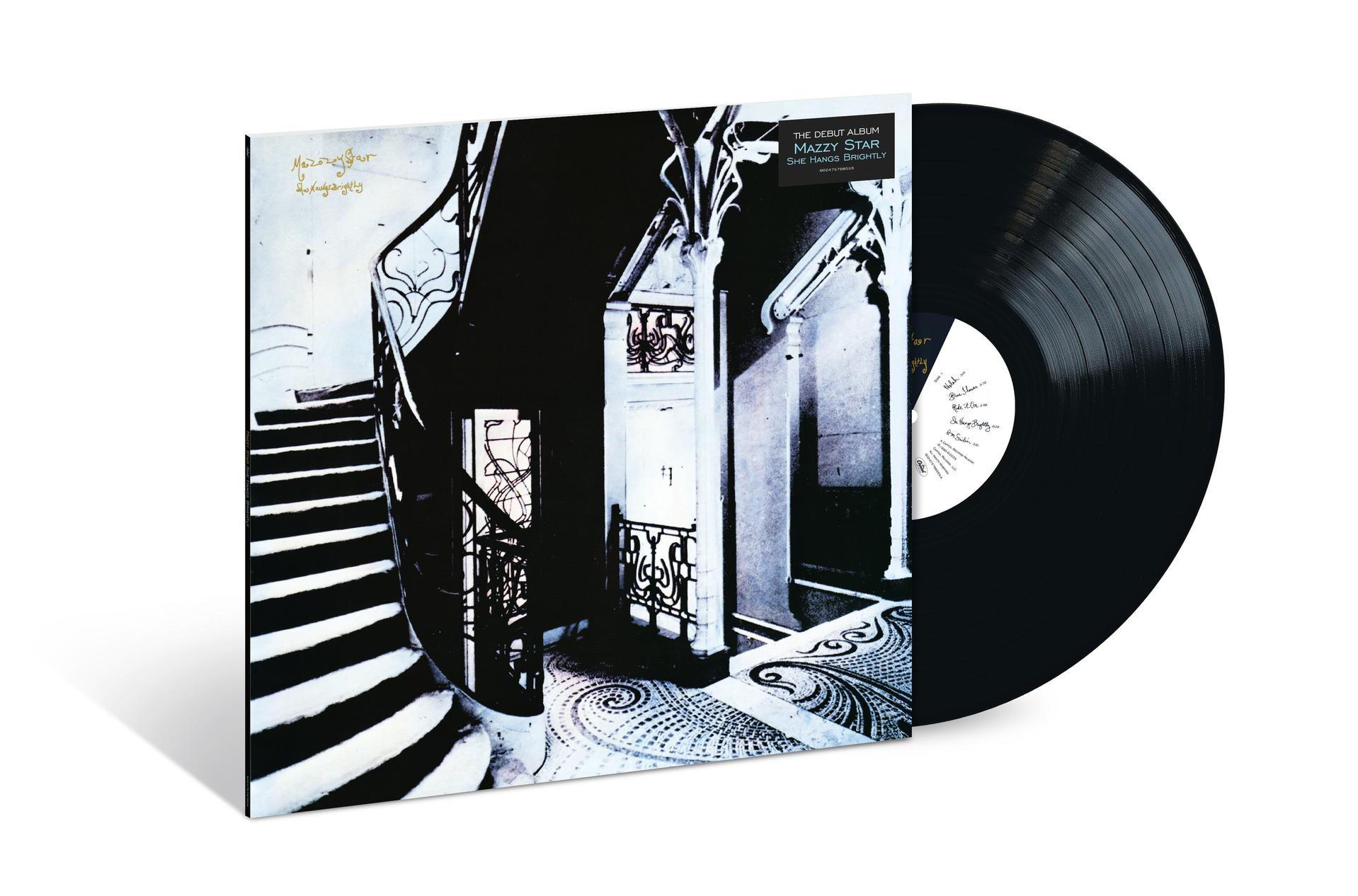 Albumcover von Mazzy Stars 'She Hangs Brightly' mit einer schwarzen Schallplatte. Das Cover zeigt ein Treppenhaus.