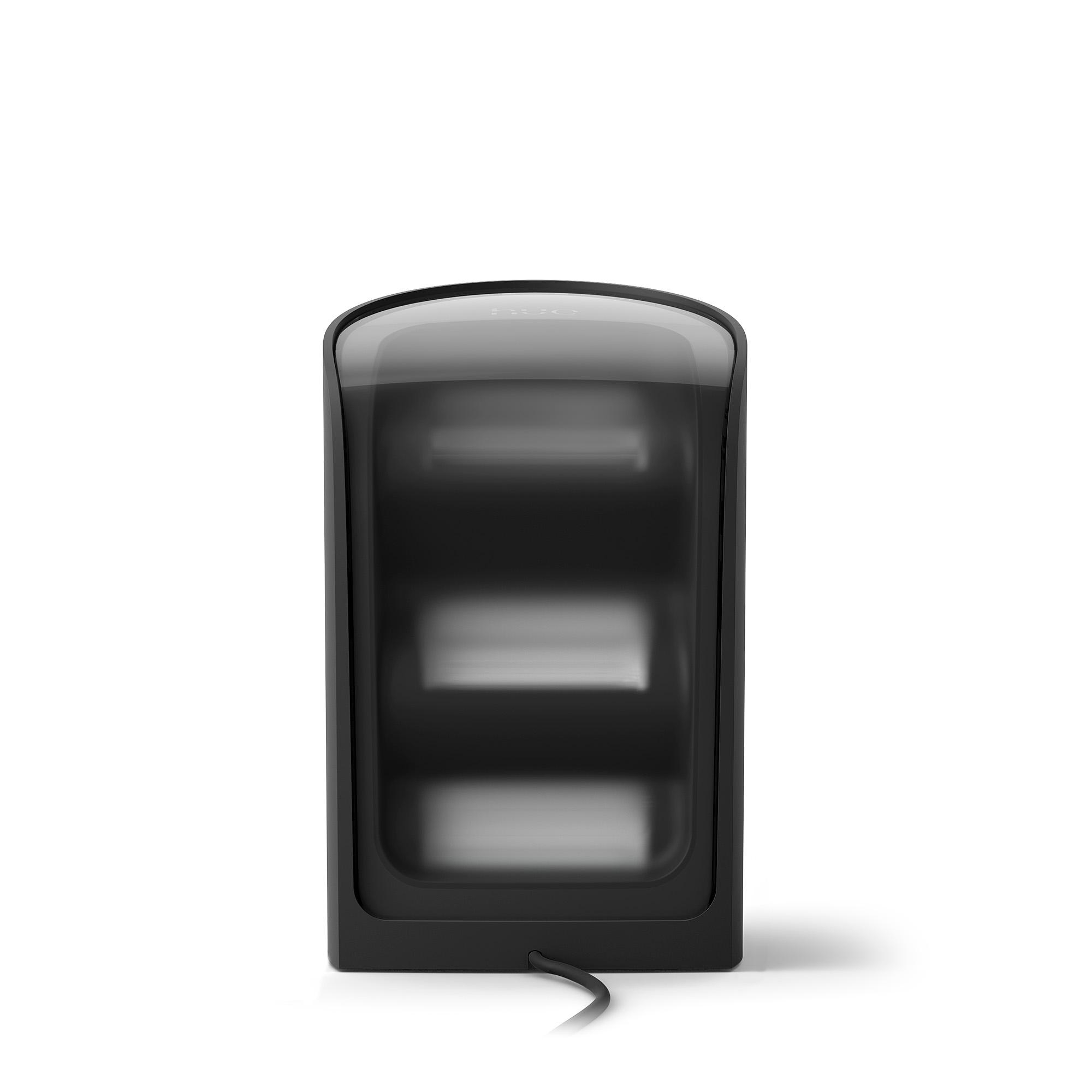 Ein schwarzes rechteckiges Gerät mit durchsichtigem Deckel. Es hat drei horizontale Linien. Ein schwarzes Kabel geht unten raus.