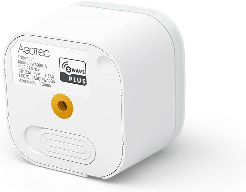 Fehér Aeotec TriSensor eszköz, Z-Wave Plus logóval, szöveges részletekkel és egy sárga kör alakú érzékelővel.