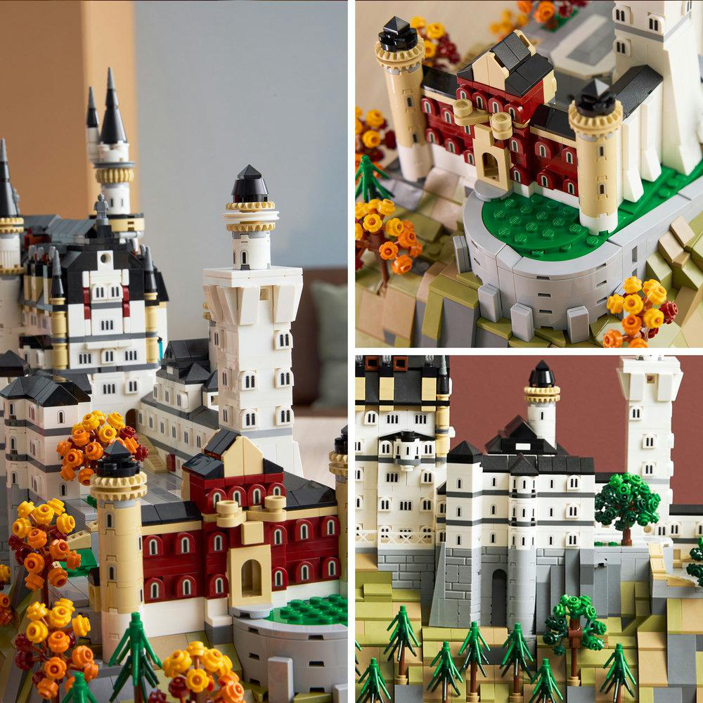 Ein LEGO-Burgmodell mit weißen, schwarzen und roten Elementen, mit Türmen, Bäumen und architektonischen Details auf einer grünen Basis.