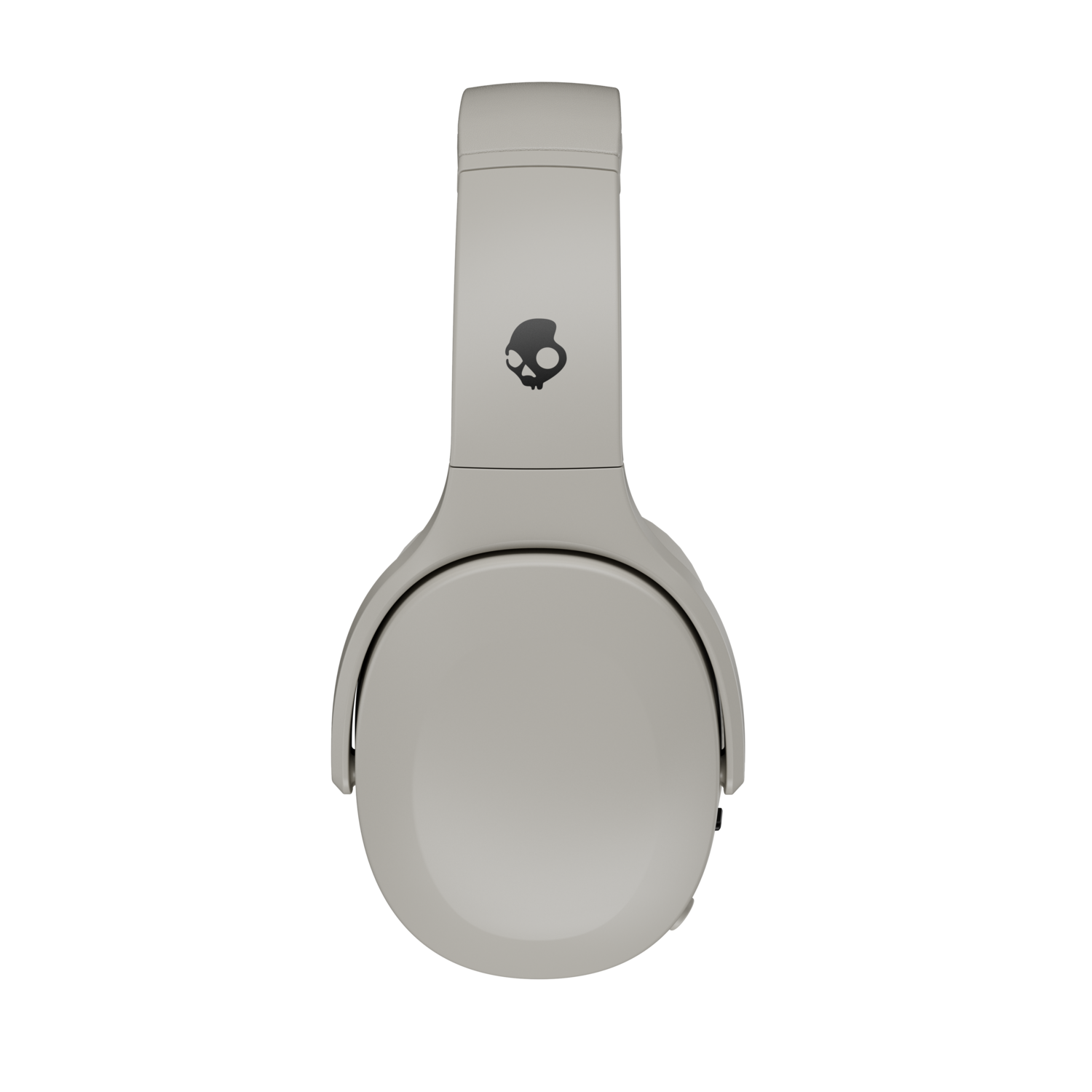 Casque Skullcandy gris clair sur fond noir. Le casque est centré et possède un logo de crâne sur le bandeau.