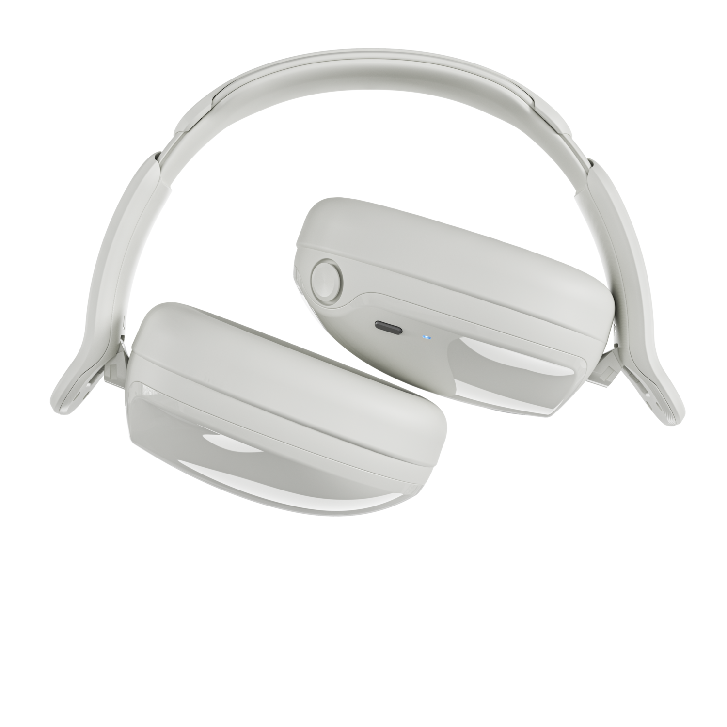 Un casque blanc sur fond noir. Le casque est incliné, les écouteurs vers le bas. Le design semble moderne et épuré.