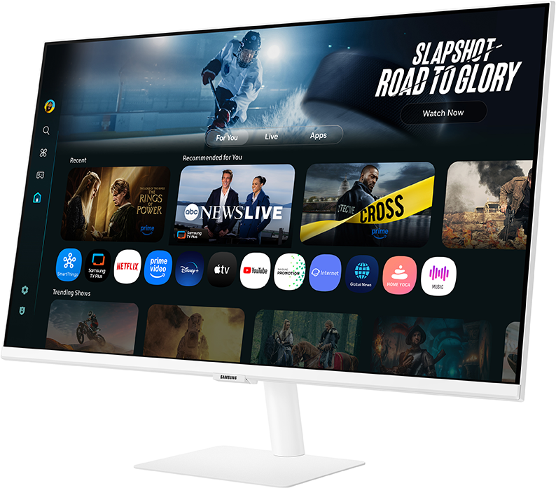Egy fehér Samsung monitor egy streaming szolgáltatás felületét jeleníti meg, alkalmazásikonokkal és műsor-bélyegképekkel.