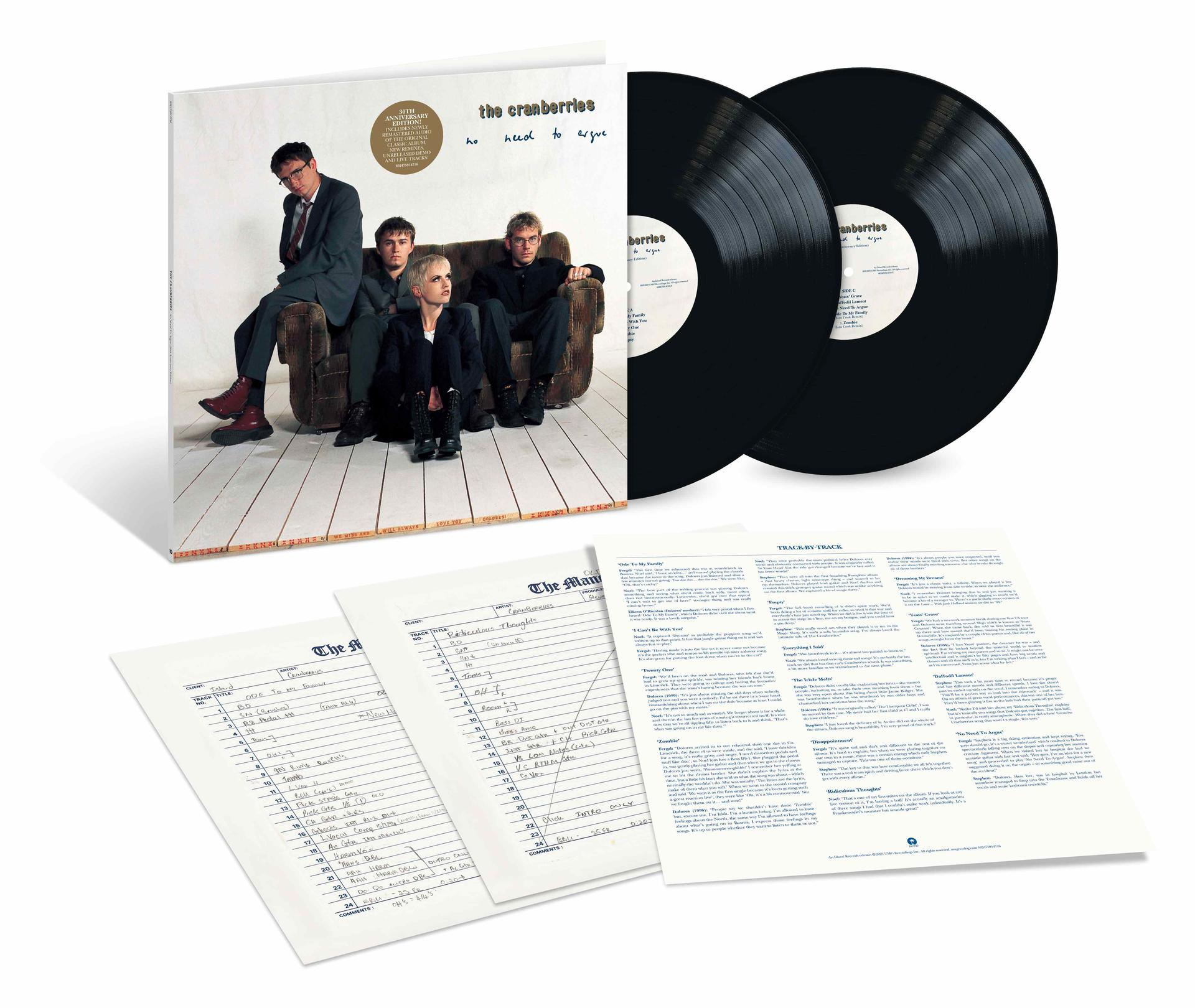 Album cover with band members, vinyl records, and handwritten song lyrics.