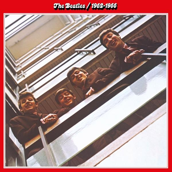 A Beatles album borítója. Négy férfi öltönyben egy erkélyről lenéz. A háttérben vonalak vannak, felül pedig a 'The Beatles' felirat.