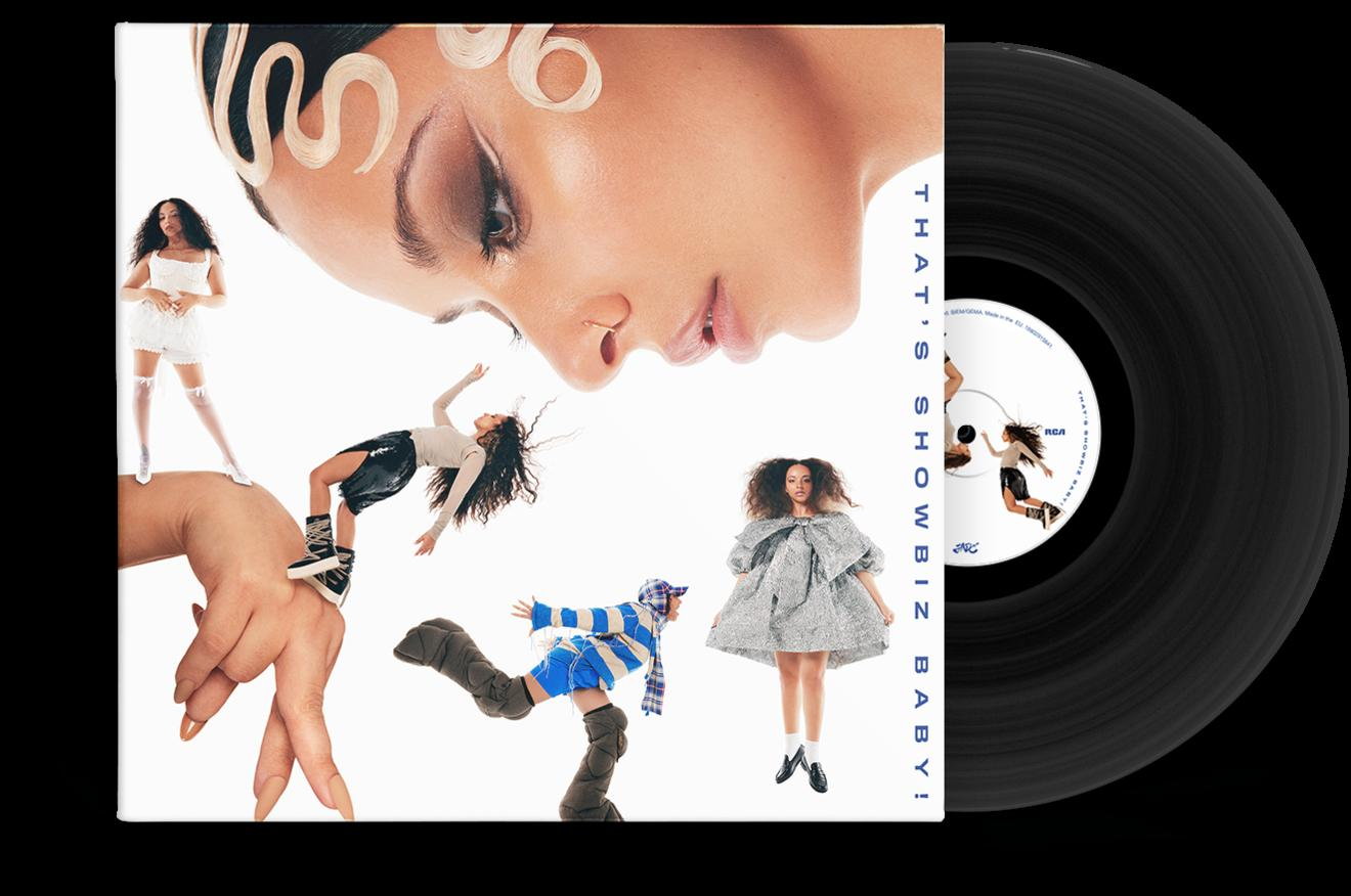 Albumcover mit Frauengesicht und Puppen. Rechts eine Schallplatte. Albumtitel: 'That's Showbiz Baby!'