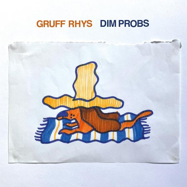 Zeichnung auf weißem Papier. Oben Text: GRUFF RHYS DIM PROBS. Darunter eine hundeartige Figur auf einer gestreiften Decke, unter einer gelben Wolke.