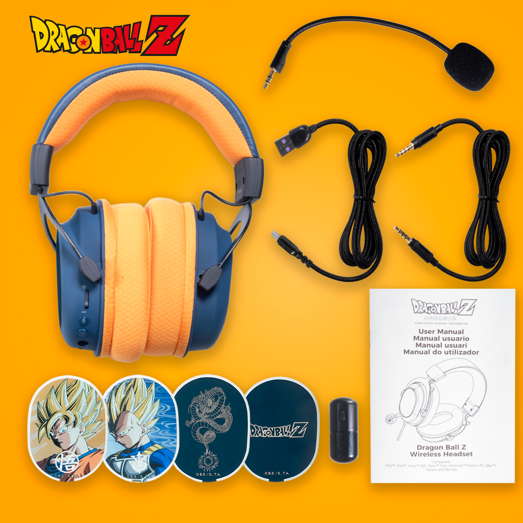 Dragon Ball Z vezeték nélküli fejhallgató tartozékokkal és használati útmutatóval narancssárga háttéren.