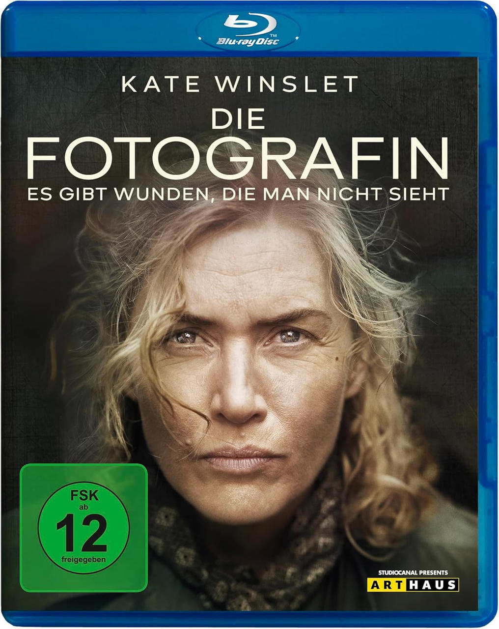 Filmcover mit Kate Winslets Gesicht, Titel 'Die Fotografin'. Eine grüne Box zeigt die Altersfreigabe. Blu-ray Disc Logo oben.