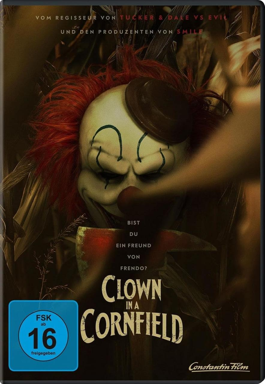Filmplakat. Ein Clown mit roten Haaren und Hut, der eine Axt hält, befindet sich in einem Maisfeld. Text: "Clown in a Cornfield".