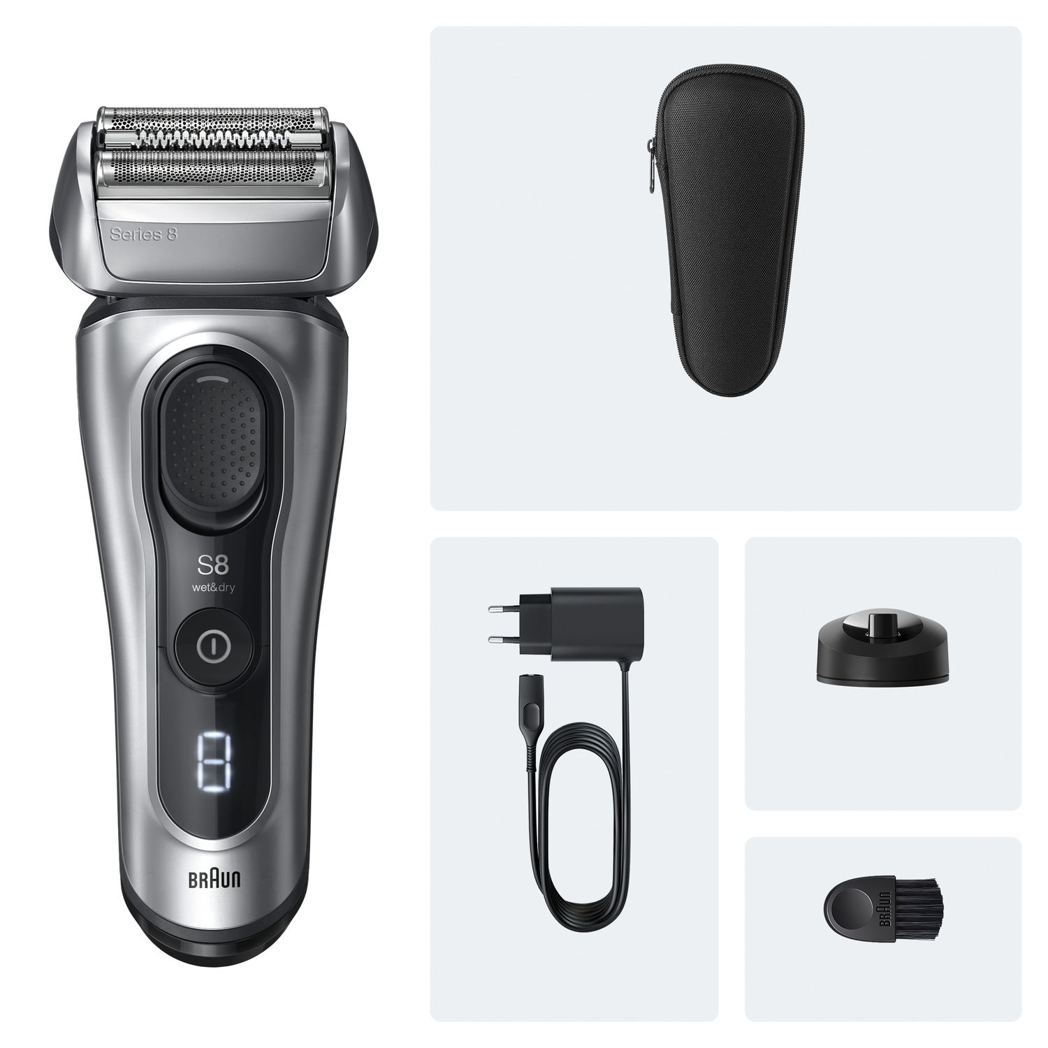 A silver Braun Series 8 electric shaver with accessories: a black case, charger, cleaning base, and brush, on a light background.