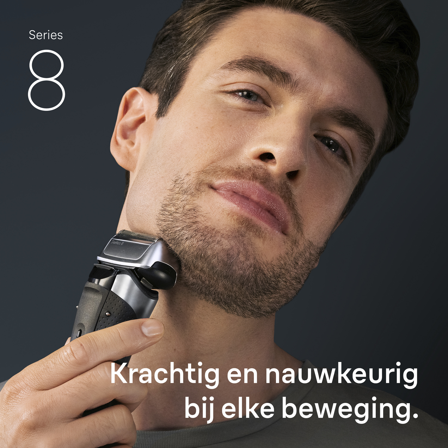 Man shaves with an electric razor. The razor is held to his face. Text says: Powerful and precise with every movement.