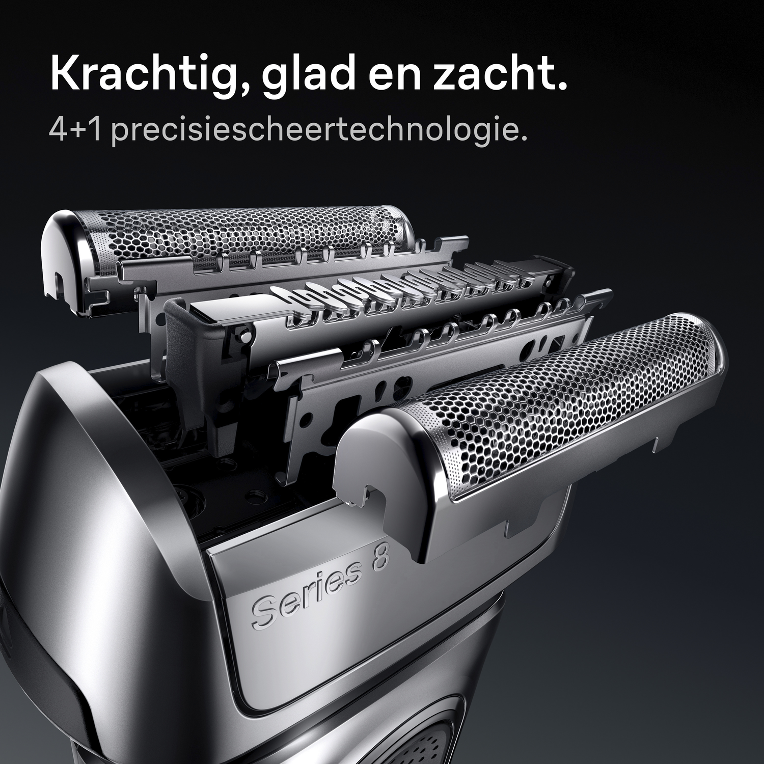 Close-up of a silver electric shaver. The shaver head has multiple blades and a metallic mesh cover. Text at the top says "Kractig, glad en zacht".