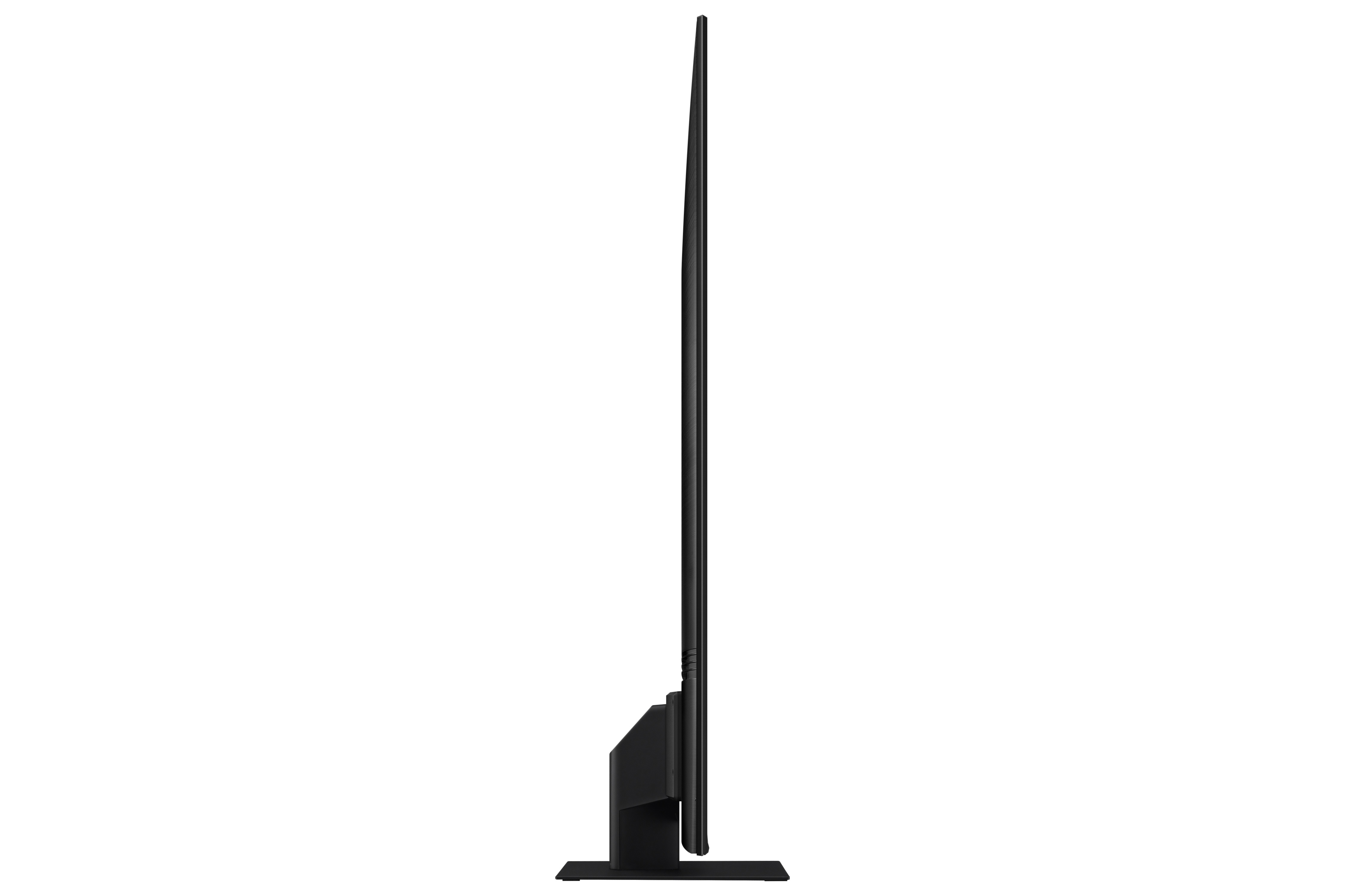 Vista laterale di una TV nera. È su una base nera. Lo sfondo è bianco.