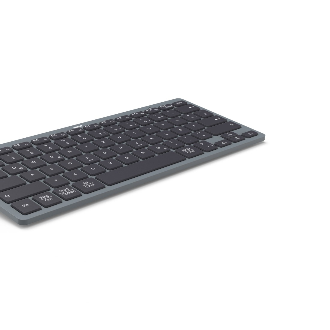 Graue Tastatur auf weißem Hintergrund. Die Tastatur hat dunkelgraue Tasten mit weißen Buchstaben. Der Markenname 'hama' ist sichtbar.