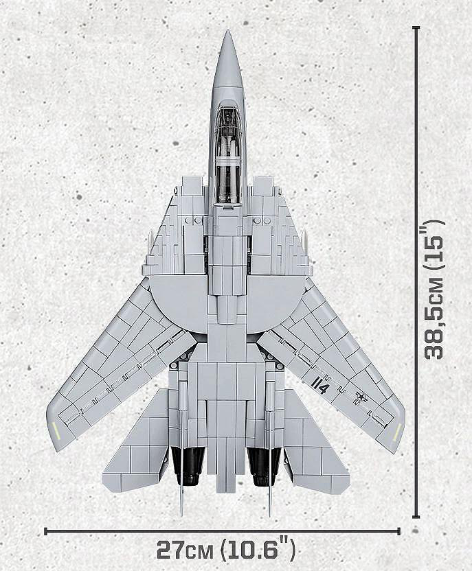 Draufsicht auf ein graues Spielzeug-Jet. Es hat Flügel und ist 27 cm (10,6") breit und 38,5 cm (15") lang. Der Hintergrund ist weiß.