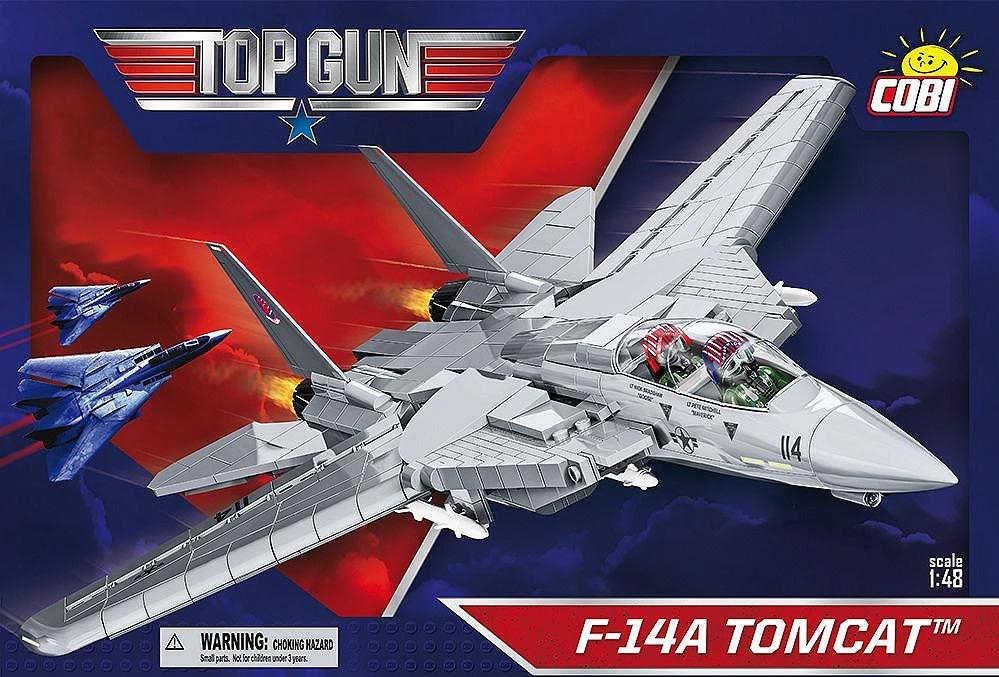 Ein Top Gun F-14A Tomcat Modell mit zwei kleineren Jets im Hintergrund. Das Modell ist grau und hat das Top Gun Logo.
