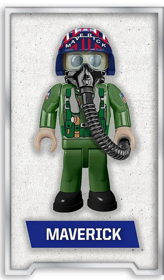 Eine Maverick-Spielfigur in grünem Fluganzug und Helm. Auf dem Helm steht 'Maverick'. Darunter ein blaues Etikett mit 'Maverick'.