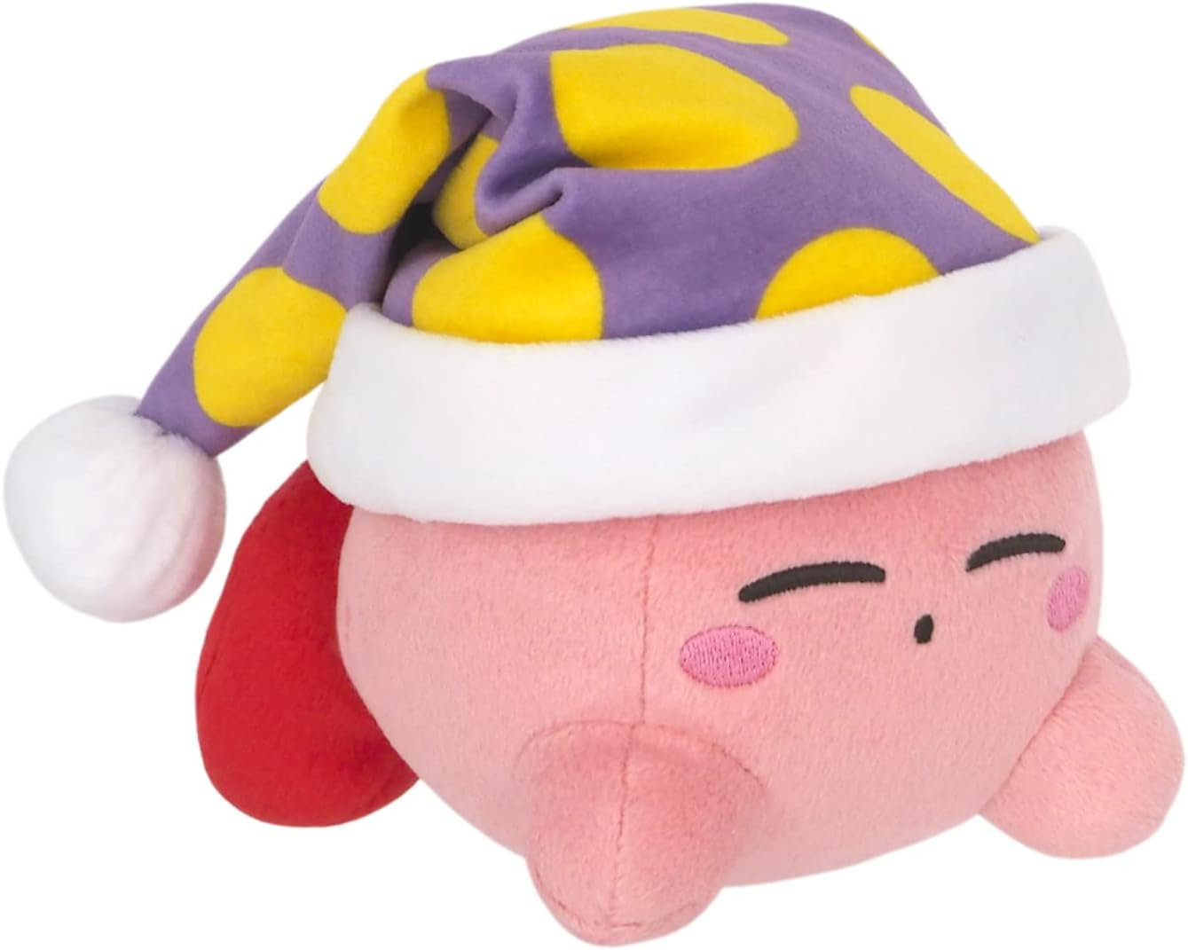 Ein rosa Kirby-Plüschtier, das eine Schlafhaube mit gelben Punkten und weißem Besatz trägt. Es hat geschlossene Augen und einen roten Arm.