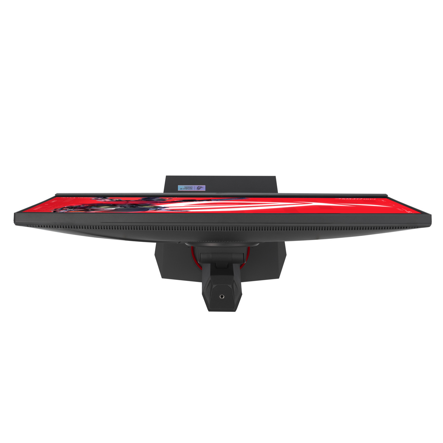 Top-down view of a black computer monitor with red accents. The screen displays a red image. The stand is visible.