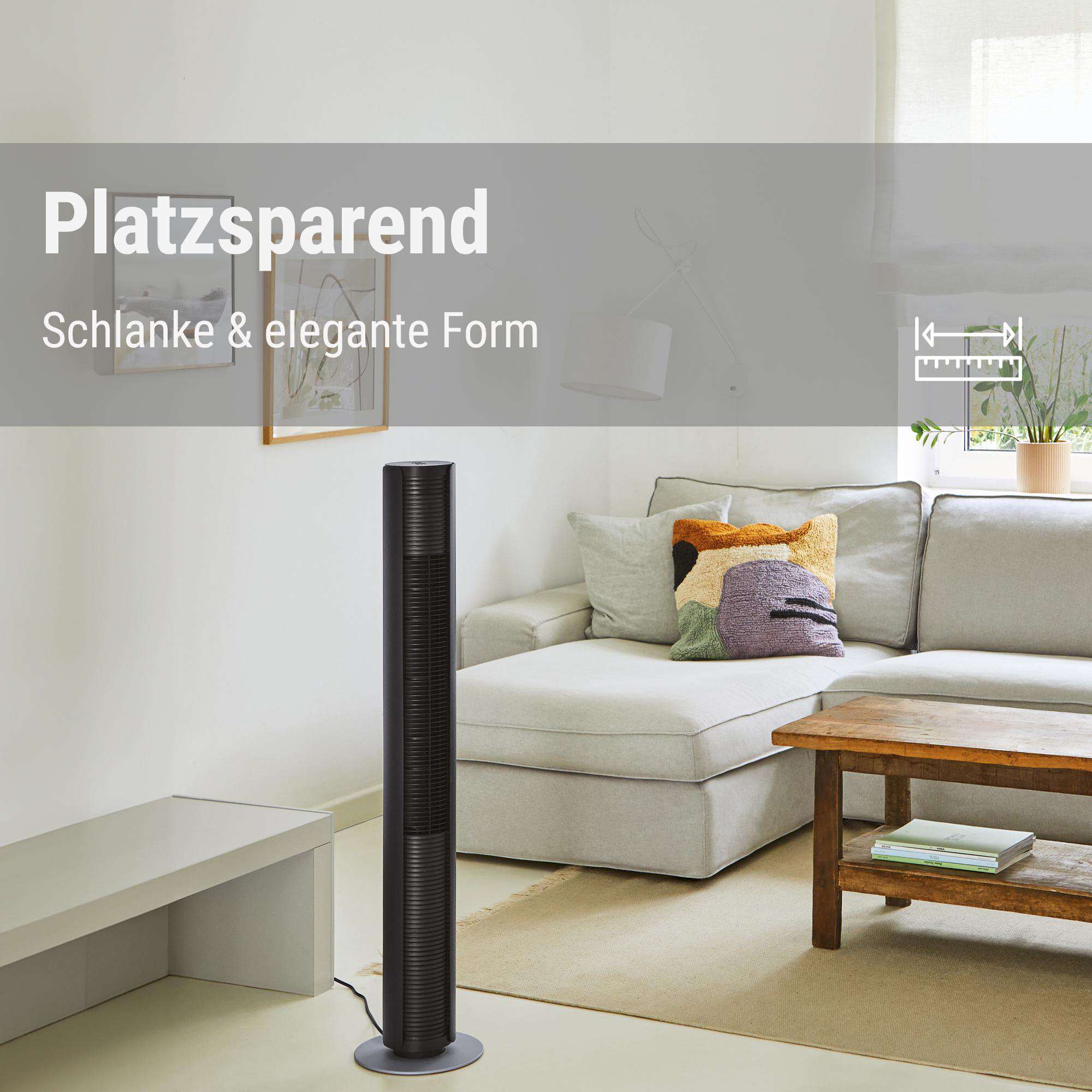 Schwarzer Turmventilator in einem modernen Wohnzimmer. Sofa, Holztisch und Kunst sind sichtbar. Text: Platzsparend, Schlanke & elegante Form.