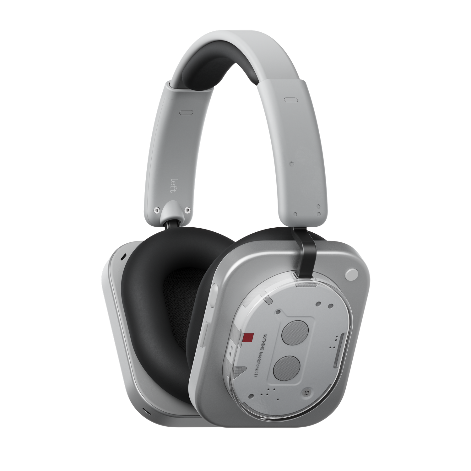 Un par de auriculares plateados y negros, con diadema blanca, sobre fondo gris. Los auriculares tienen un diseño moderno.