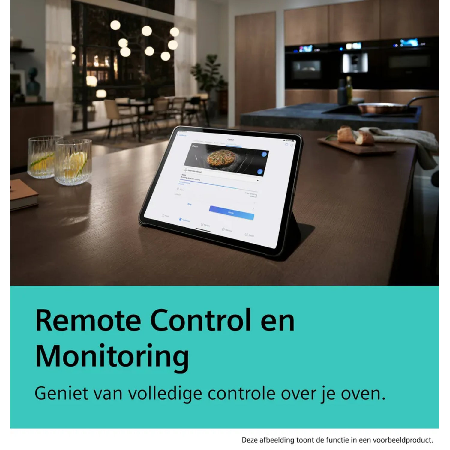 Tablet on a table displays oven controls. The background shows a kitchen with ovens and a dining area with lights.