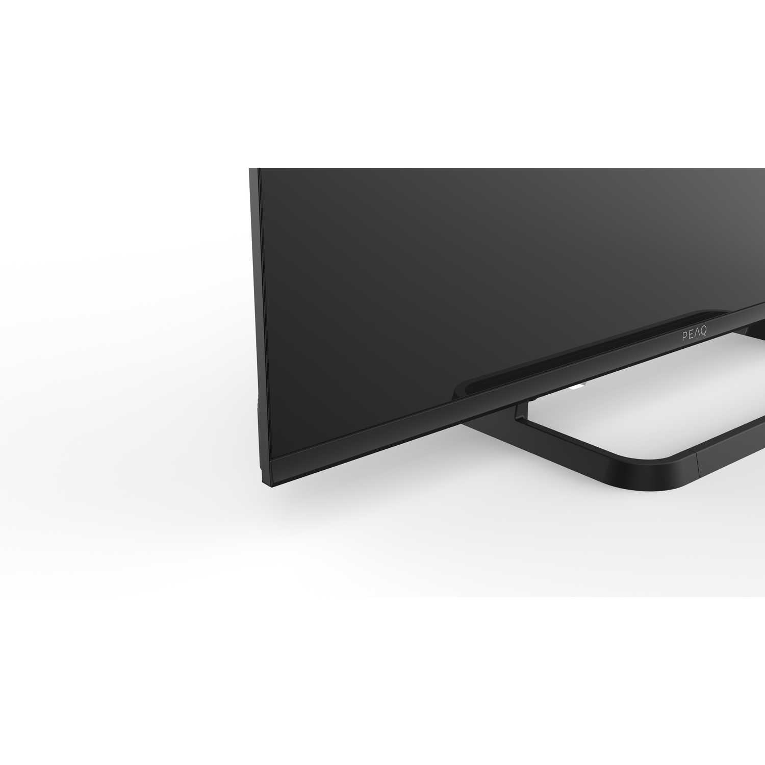 A black TV screen with a black stand is displayed on a white background. The brand name PEAQ is visible on the screen's bottom.