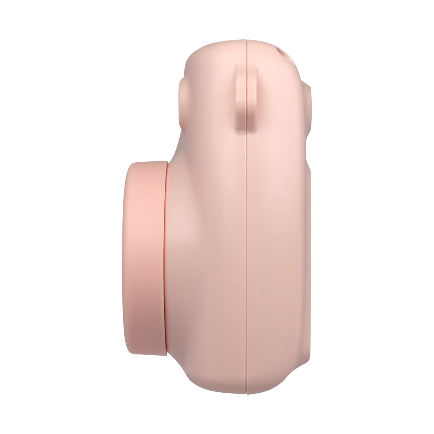 A light pink instant camera is seen from the side against a black background. It has a lens, rounded body, and a small handle.