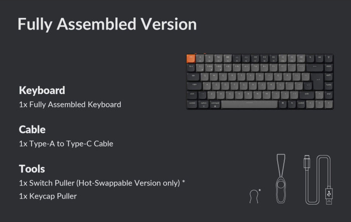 Eine vollständig montierte Tastatur mit Tasten, ein Kabel und Werkzeuge zum Entfernen von Tasten werden auf dunklem Hintergrund angezeigt.