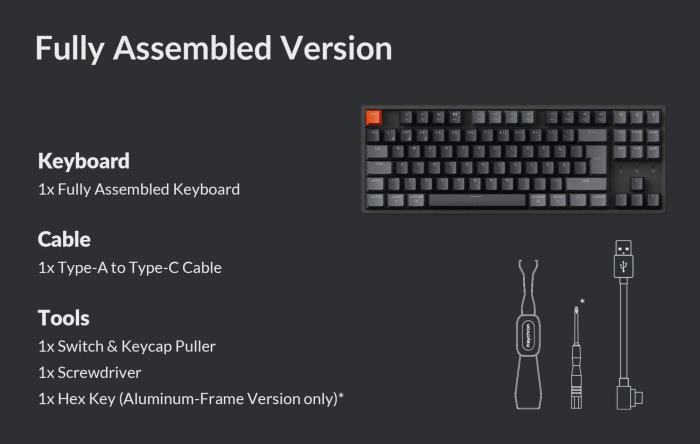Das Bild zeigt eine Tastatur, ein Kabel und Werkzeuge. Die Tastatur ist schwarz mit einer orangefarbenen Escape-Taste.