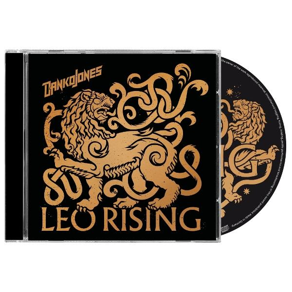 CD-Hülle mit schwarzem Hintergrund und goldenem Löwendesign. Text: Danko Jones, Leo Rising. CD hat ein passendes Löwendesign.
