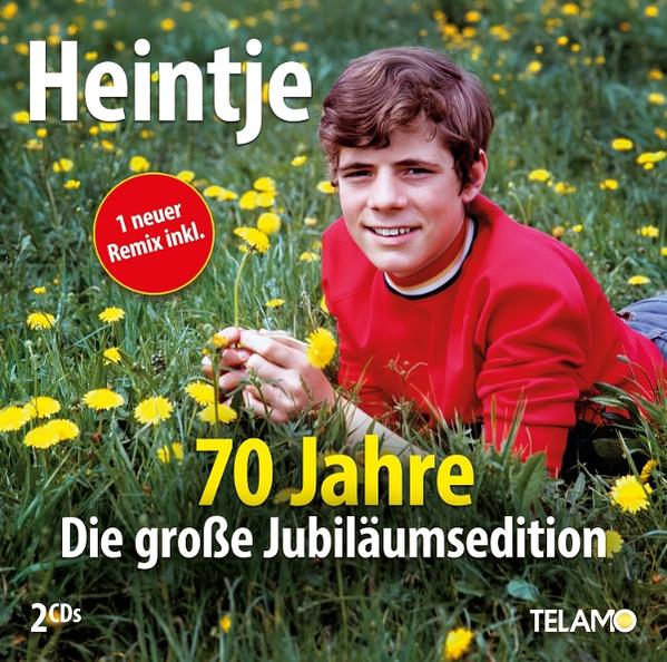 Ein junger Mann in rotem Hemd liegt in einem Löwenzahnfeld. Das Cover sagt 'Heintje' und '70 Jahre'.
