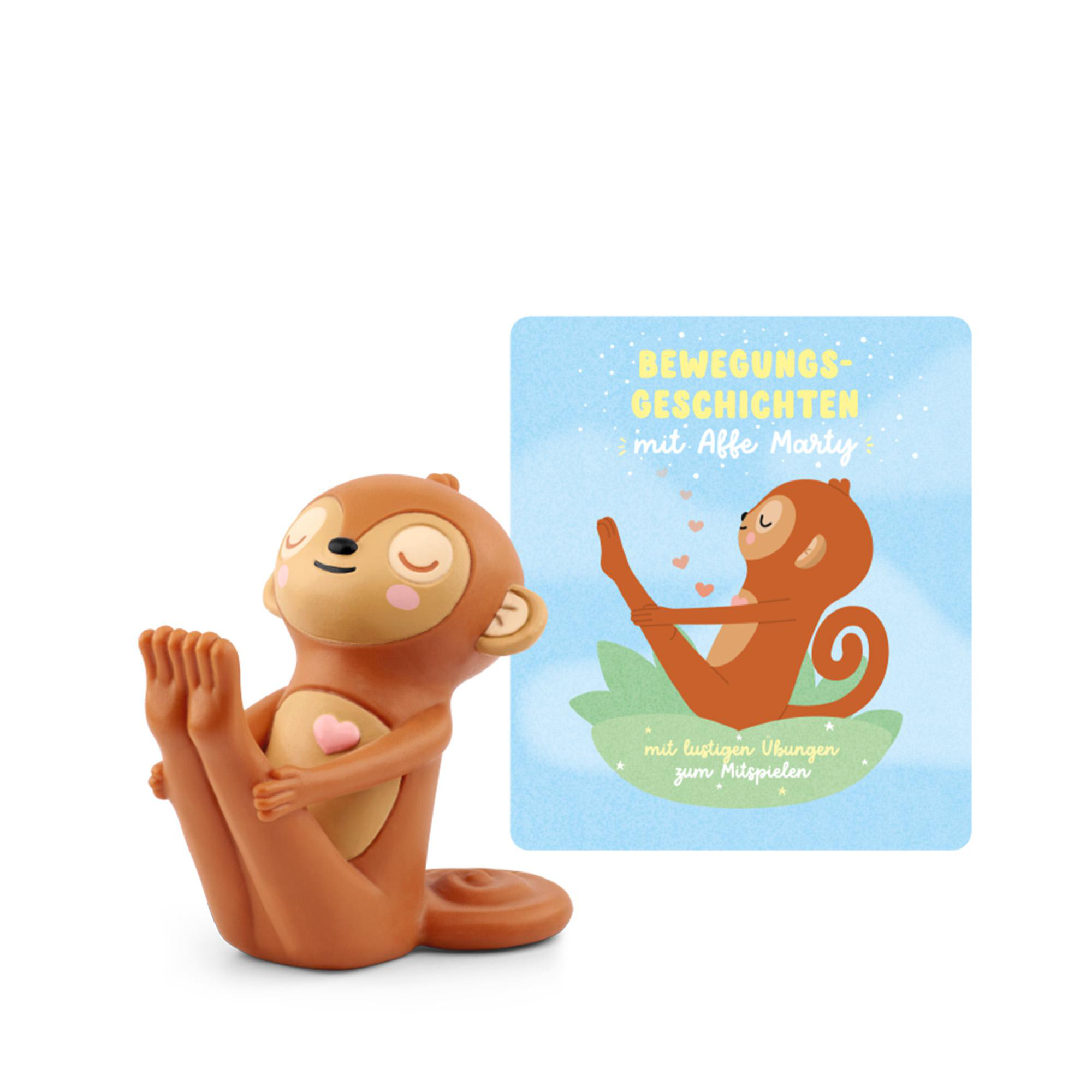 Eine braune Affenfigur in einer Yoga-Pose, neben einer Karte mit einem Cartoon-Affen, der Yoga macht. Der Hintergrund ist weiß.