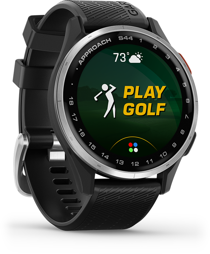 Egy fekete Garmin Approach S44 golfóra a képernyőjén a 'PLAY GOLF' feliratot jeleníti meg, egy golfos ikonnal és 73 fokkal. A szíj fekete.