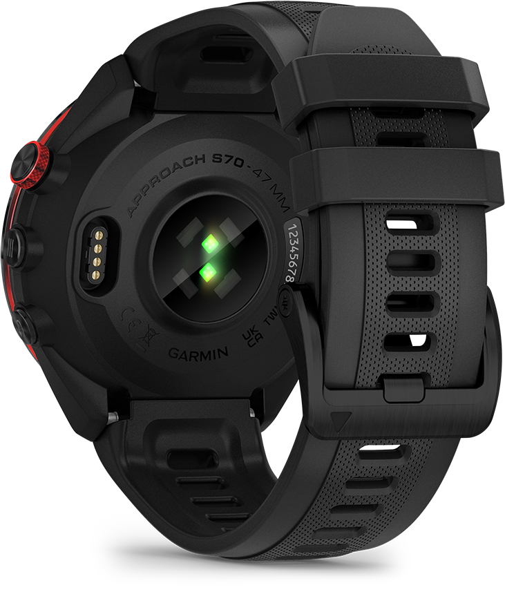 Fekete Garmin Approach S70 óra, a hátulja látható. Fekete szíj, piros gombok, zöld fények.